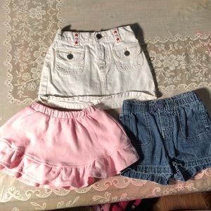 Lot of 18 month girls skirts and pair of shorts.